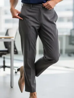 Model in comfortable, wrinkle-resistant casual dress pants