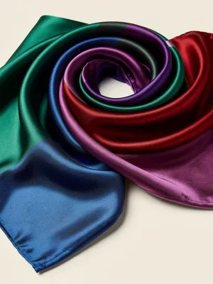 Luxurious silk scarf draped elegantly, symbolizing quality and lasting style.