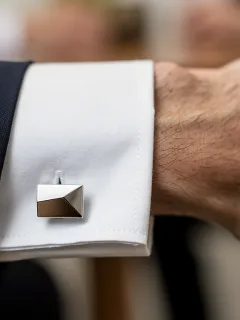 Elegant cufflink accessories on a professional's shirt for 2026