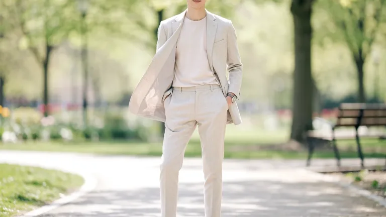 Woman wearing a linen-blend blazer, effortlessly transitioning from spring to summer style.
