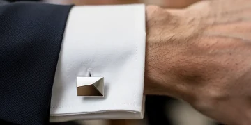 Elegant cufflink accessories on a professional's shirt for 2026